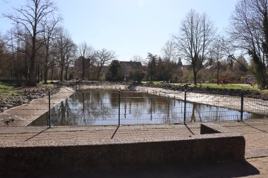 Old condition west pond with love locks