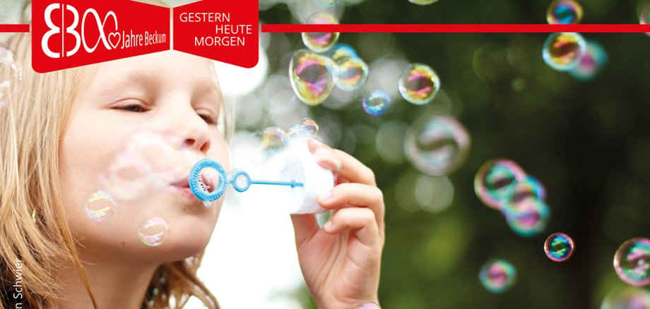 Girl blowing soap bubbles