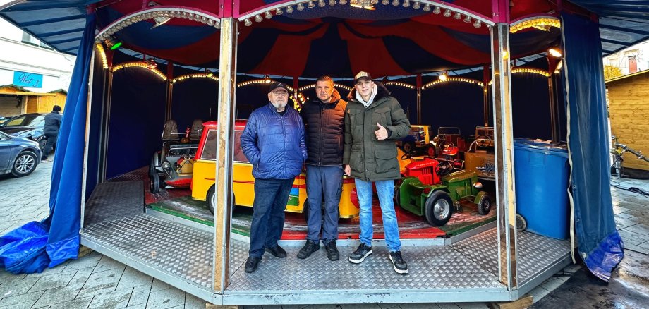 Showman family Anton in front of the children's carousel