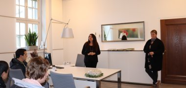 Registry office staff explain their work in the wedding room